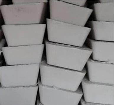 Non-ferric alum blocks used as a water treatment coagulant