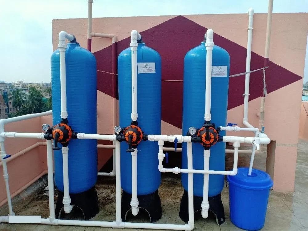 Water softener vessels installed with valves and pipework